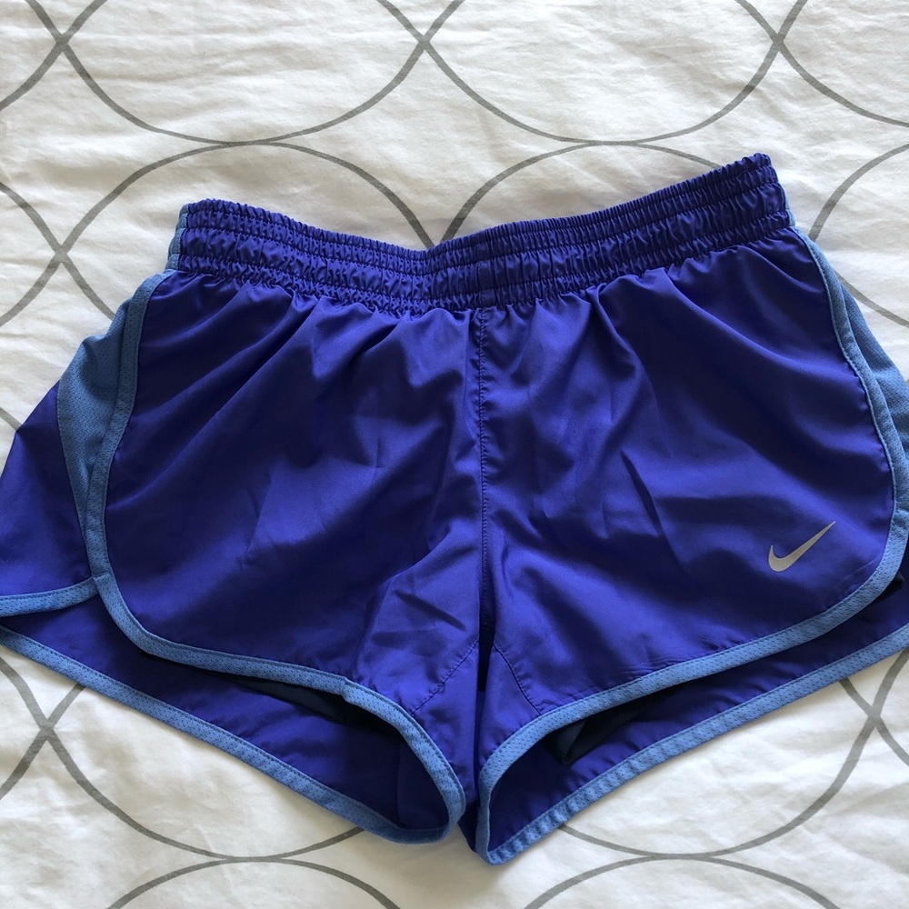 Women’s purple Nike dri fit running shorts